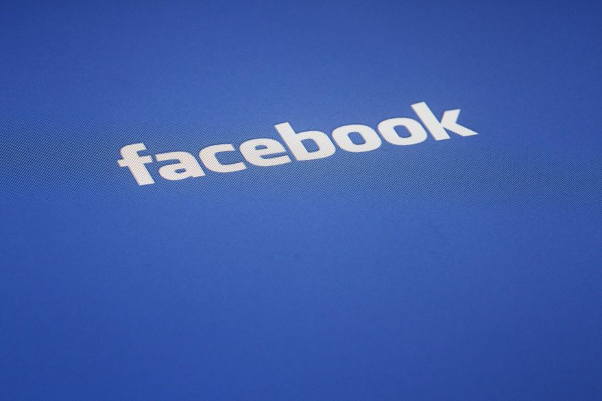 FILE - In this Wednesday, May 16, 2012, file photo, a Facebook logo is displayed on the screen of an iPad, in New York. A Facebook video of an Ohio man shooting a 74-year-old retiree in Cleveland was up for three hours Sunday, April 16, 2017, after it was posted, raising questions about the social-media network's process for taking down objectionable content posted by its users. The company said it does not allow such "horrific crime" on Facebook. It did not immediately respond to further questions about the incident. (AP Photo/James H. Collins, File)