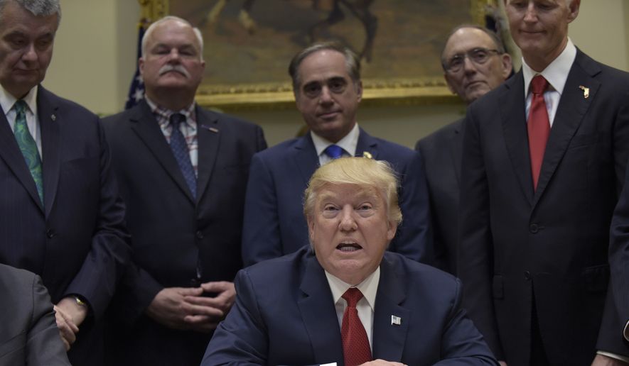 President Donald Trump held a signing ceremony Wednesday for the Veterans Choice Program Extension and Improvement Act. (Associated Press)