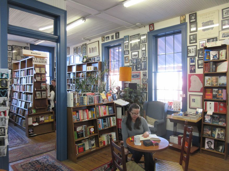 This March 12, 2017 photo shows Square Books, a bookstore in Oxford, Miss. The store offers a well-curated selection of books about the region, including works by the town's most famous resident, the late novelist William Faulkner. (AP Photo/Beth J. Harpaz)