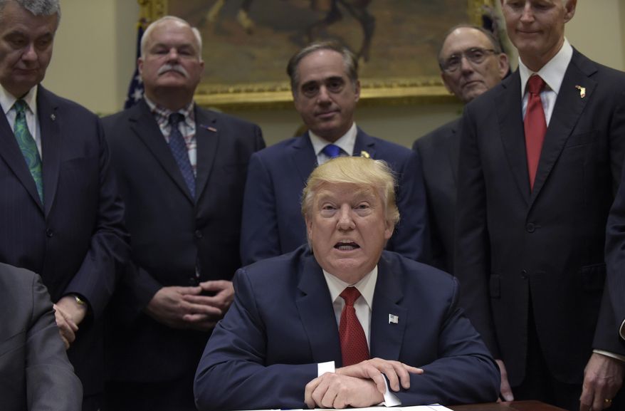 President Donald Trump talks about the Veterans Choice Program Extension and Improvement Act before signing it, Wednesday, April 19, 2017, in the Roosevelt Room of the White House in Washington. (AP Photo/Susan Walsh)