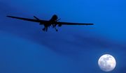 In this Jan. 31, 2010 file photo, an unmanned U.S. Predator drone flies over Kandahar Air Field, southern Afghanistan on a moonlit night. Today, when U.S. intelligence agencies believe they know the location of a terrorist in Pakistan and a few other countries, they are largely free to deploy a weapon that&#39;s become the symbol of war on terror: an aerial drone. The drone drops a bomb or fires a missile that executes the suspect. University of Utah law professor Amos Guiora is pushing for another step before the U.S. government or military could decide to kill a terror suspect with a drone. In a proposal to be published in 2015, Guiora and a colleague are pushing for what they call a &quot;drone court.&quot; The court would be part of the judiciary branch and hear arguments for why the United States should target a suspect with a drone strike. (AP Photo/Kirsty Wigglesworth, File)