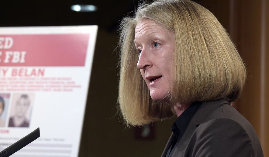 FILE - In this March 15, 2017, file photo, acting Assistant Attorney General Mary McCord speaks during a news conference at the Justice Department in Washington. McCord, the Justice Department's top national security official is leaving her position in May 2017. McCord told the staff of the department's national security division this week she’s leaving to pursue other opportunities. Her departure comes as she is leading the department’s investigation into whether President Donald Trump’s campaign had ties to Russia's meddling in the 2016 election. (AP Photo/Susan Walsh, File)