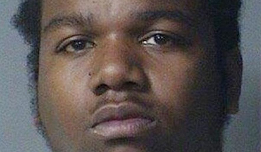 This booking photo made available by the Norfolk Police, Va., shows Rayvon A. Messer on Thursday, April 20, 2017. Authorities have charged Messer in the shooting death of his 3-year-old-son. Messer is being held without bail. (Norfolk Police via AP)