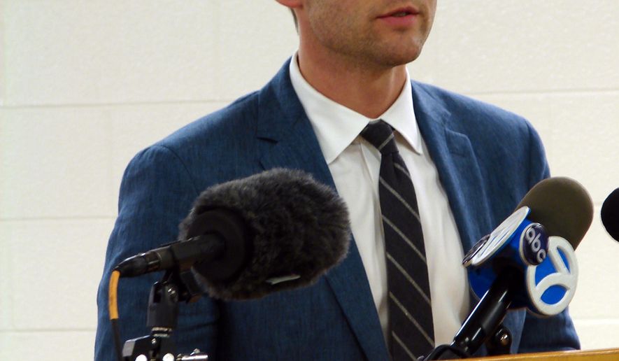 J.R. Davis, a spokesman for Arkansas Gov. Asa Hutchinson, speaks with reporters early Friday, April 21, 2017, following the execution of death row inmate Ledell Lee. Lee's death late Thursday night was Arkansas' first execution since 2005. (AP Photo/Kelly P. Kissel)