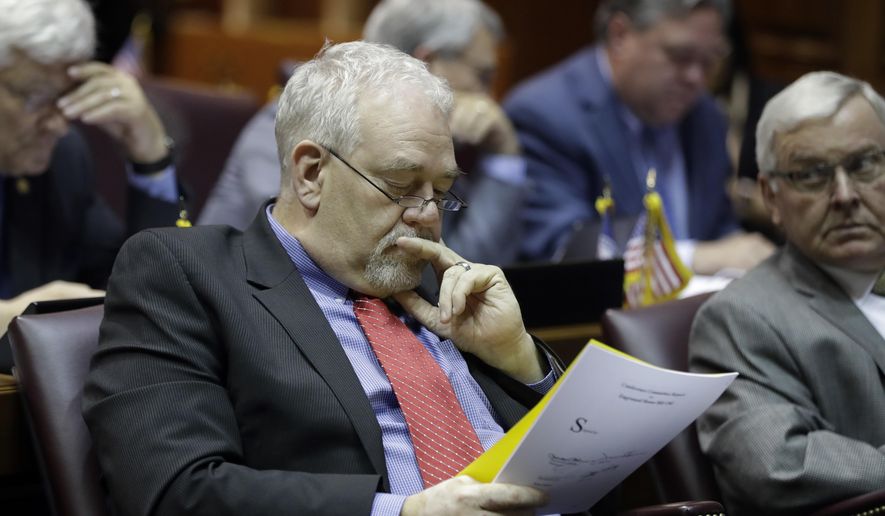 House Majority Leader Matt Lehman, R-Berne, looks at a bill during a session at the Statehouse Friday, April 21, 2017, in Indianapolis. (AP Photo/Darron Cummings)