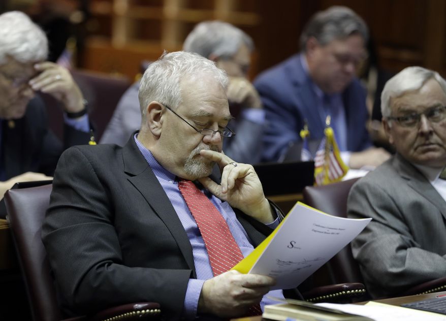 House Majority Leader Matt Lehman, R-Berne, looks at a bill during a session at the Statehouse Friday, April 21, 2017, in Indianapolis. (AP Photo/Darron Cummings)