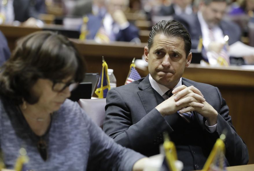 House Minority Leader Scott Pelath, D-Michigan City, listens during the session at the Statehouse Friday, April 21, 2017, in Indianapolis. (AP Photo/Darron Cummings)