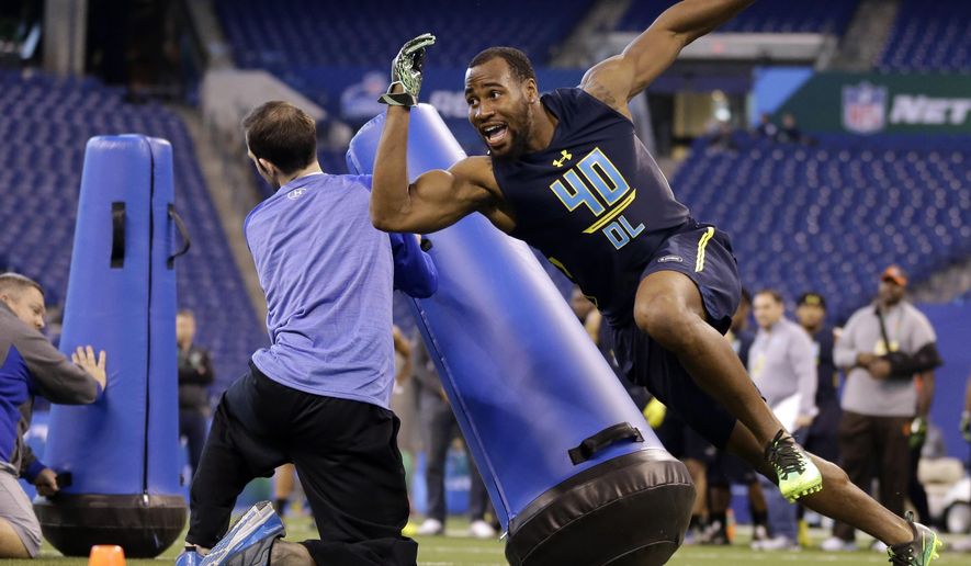 FILE - In this March 5, 2017, file photo, Temple's Haason Reddick runs a drill at the NFL football scouting combine in Indianapolis. A case can be made that no player in this NFL draft has benefited more from the process that follows the college football season than Reddick. With stellar showings at the Senior Bowl and combine, the Temple linebacker has gone from a possible first-round pick to a potential top-10 selection. (AP Photo/Michael Conroy, File)