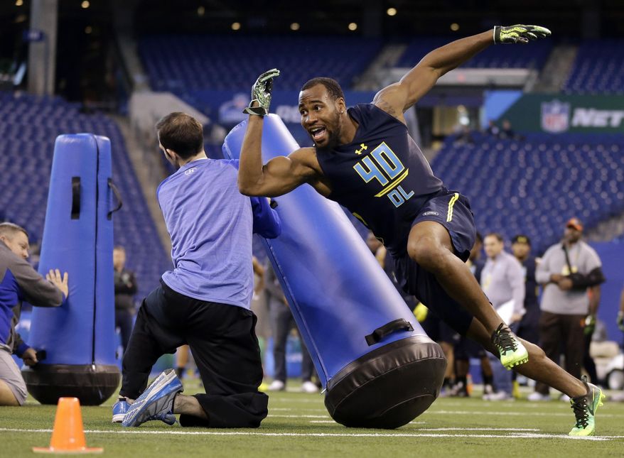 FILE - In this March 5, 2017, file photo, Temple's Haason Reddick runs a drill at the NFL football scouting combine in Indianapolis. A case can be made that no player in this NFL draft has benefited more from the process that follows the college football season than Reddick. With stellar showings at the Senior Bowl and combine, the Temple linebacker has gone from a possible first-round pick to a potential top-10 selection. (AP Photo/Michael Conroy, File)