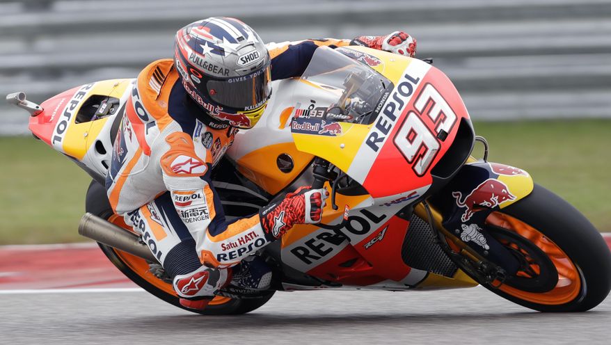 Marc Marquez (93), of Spain, steers through a turn during open practice for the Grand Prix of the Americas MotoGP motorcycle race, Saturday, April 22, 2017, in Austin, Texas. (AP Photo/Eric Gay)