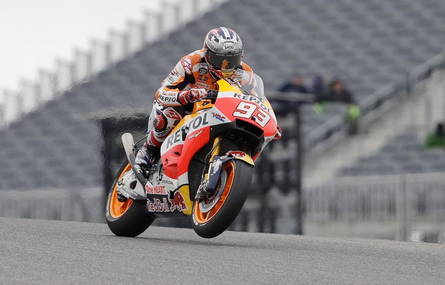 Marc Marquez (93), of Spain, comes out of a turn during open practice for the Grand Prix of the Americas MotoGP motorcycle race, Saturday, April 22, 2017, in Austin, Texas. (AP Photo/Eric Gay)
