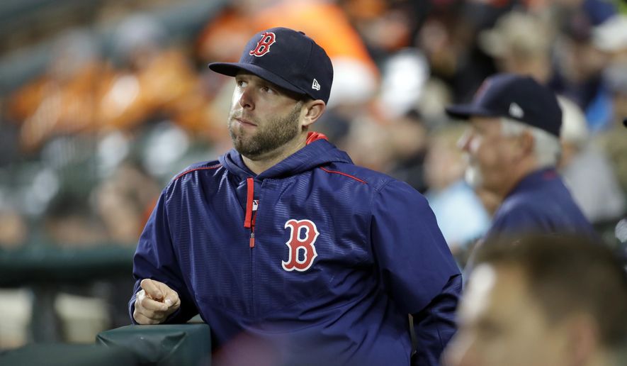 Boston Red Sox's Dustin Pedroia stands in the dugout in the third inning of a baseball game against the Baltimore Orioles in Baltimore, Saturday, April 22, 2017. Pedroia sat out the game after being injured on a play in Friday's game against Baltimore. (AP Photo/Patrick Semansky)