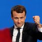 French centrist presidential candidate Emmanuel Macron, addressing cheering supporters in Paris on Sunday, told them they are &quot;the faces of French hope&quot; and vowed to be a president &quot;who protects, who transforms and builds.&quot; The centrist ex-banker who set up his party just a year ago garnered the most votes. (Associated Press)