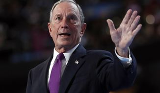 FILE - In this Wednesday, July 27, 2016, file photo, former New York City Mayor Michael Bloomberg waves after speaking to delegates during the third day session of the Democratic National Convention in Philadelphia. The former New York City mayor addressed his intensifying focus on climate change on Saturday, April 22, 2017, in an email interview with The Associated Press. Bloomberg said he wants to help save an international agreement to reduce carbon emissions. (AP Photo/Carolyn Kaster, File)