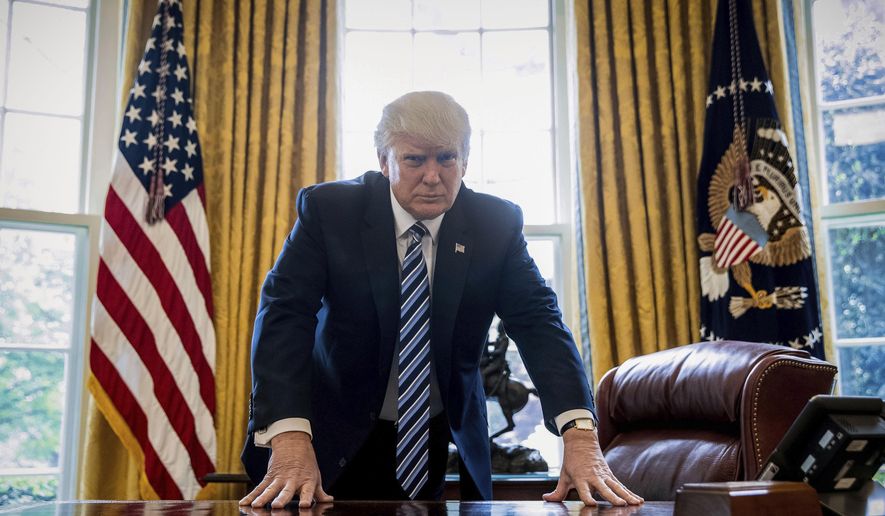 President Donald Trump poses for a portrait in the Oval Office in Washington, Friday, April 21, 2017. With his tweets and his bravado, Trump is putting his mark on the presidency in his first 100 days in office. He&#x27;s flouted conventions of the institution by holding on to his business, hiring family members as advisers and refusing to release his tax returns. He&#x27;s tested conventional political wisdom by eschewing travel, church, transparency, discipline, consistency and decorum. But the presidency is also having an impact on Trump, prompting him, at times, to  play the role of traditional president. (AP Photo/Andrew Harnik)