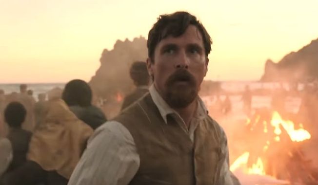 Actor Christian Bale stars as reporter Chris Myers in the &quot;The Promise,&quot; released April 21, 2017. (YouTube, &quot;The Promise&quot; official trailer) ** FILE **