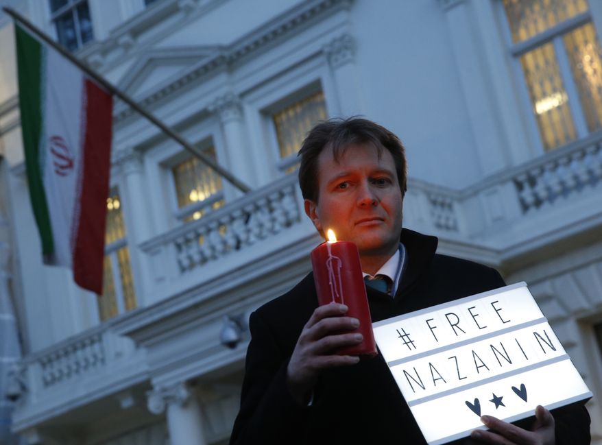 FILE -- In this Jan. 16, 2017 file photo, Richard Ratcliffe, husband of imprisoned charity worker Nazanin Zaghari-Ratcliffe, poses for the media during an Amnesty International led vigil outside the Iranian Embassy in London. The family of Zaghari-Ratcliffe who was detained in Iran while on a trip with her toddler daughter says all efforts to appeal her five-year prison sentence in court have failed. Ratcliffe, who works for the Thomson Reuters Foundation, the charitable arm of the news agency, found out this weekend that her appeal to Iran&#x27;s supreme court failed. (AP Photo/Alastair Grant, File)