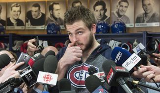 Montreal Canadiens&#39; Alex Galchenyuk ponders a question as he meets with reporters, Monday, April 24, 2017 in Brossard, Quebec, Monday, April 24, 2017. The Canadiens were eliminated by the New York Rangers in the first round of the NHL hockey playoffs. (Paul Chiasson/The Canadian Press via AP)