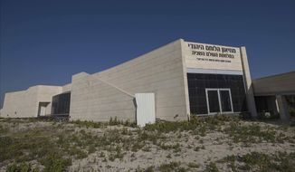This Tuesday, April 18, 2017 photo, shows the unfinished museum honoring Jewish World War II veterans, in Latrun, Israel. Two years after Israel&#39;s Prime Minister Benjamin Netanyahu vowed to complete the establishment of a museum honoring Jewish World War II veterans, funds have dried up and an abandoned construction site is all that remains of the project. The story of the 1.5 million Jews who fought the Nazis -- and the 250,000 who died in battle -- has long been lost in Israel amid the larger tragedy of the Holocaust. (AP Photo/Tsafrir Abayov)