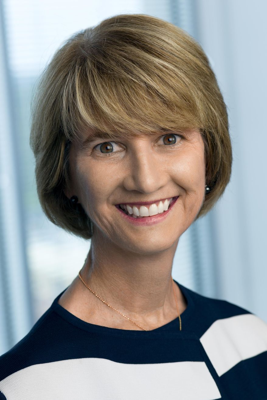 In this July 9, 2015 photo provided by Robert Severi, Kristina Johnson poses for a photo in Washington, D.C. The State University of New York says its board of trustees is expected to approve Johnson's appointment as the university's chancellor Monday, Monday, April 24, 2017. A former dean of Duke University's engineering school, Johnson served as an energy undersecretary during the Obama administration from 2009 to the end of 2010. (Robert Severi via AP)