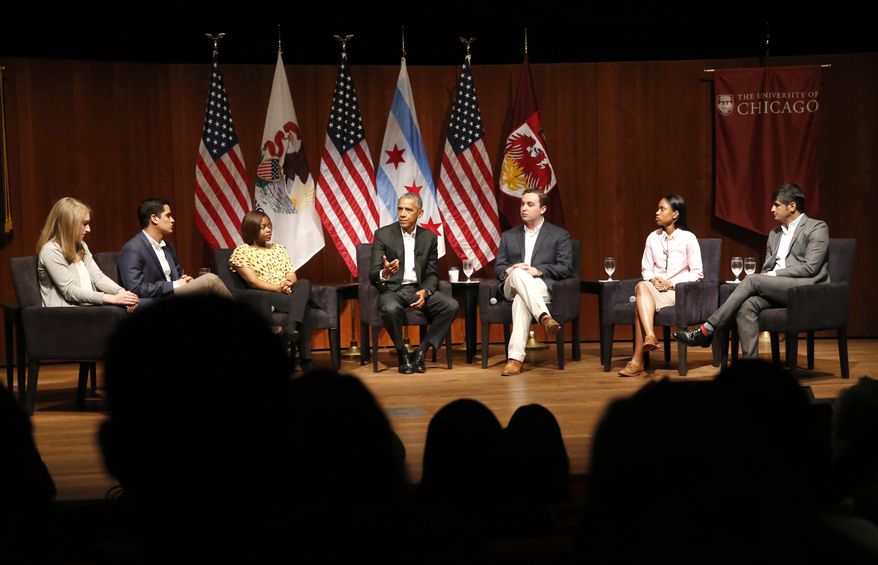 Former President Barack Obama, center, hosts a conversation on civic engagement and community organizing, Monday, April 24, 2017, at the University of Chicago in Chicago. From left are, Kelsey McClear, Loyola University; Ramuel Figueroa, Roosevelt University; Tiffany Brown, a pharmacist; Obama; Max Freedman, University of Chicago; Ayanna Watkins, Kenwood High School; and Harish Patel, New America. (AP Photo/Charles Rex Arbogast)