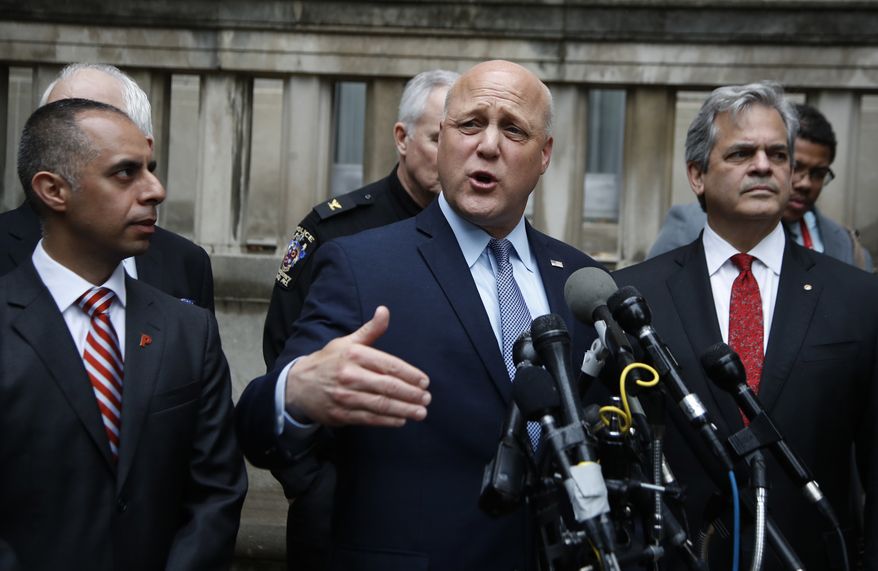 New Orleans, La. Mayor Mitch Landrieu, center, flanked by Providence, R.I. Mayor Jorge Elorza, left, and Austin, Texas Mayor Steve Adler, accompanied by members of the U.S. Conference of Mayors leadership, speaks to reporters outside the Justice Department in Washington, Tuesday, April 25, 2017, following a meeting with Attorney General Jeff Sessions. (AP Photo/Manuel Balce Ceneta)