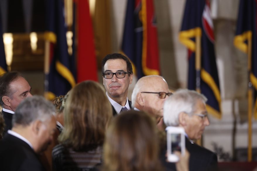 Treasury Secretary Steve Mnuchin arrives on Capitol Hill in Washington, Tuesday, April 25, 2017, for the United States Holocaust Memorial Museum's National Days of Remembrance ceremony. (AP Photo/Pablo Martinez Monsivais)