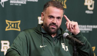 FILE - In this March 16, 2017, file photo, Baylor head football coach Matt Rhule answers questions from the media Thursday, March 16, 2017, in Waco, Texas. Rhule is going back to Philadelphia, to be at the NFL draft with his former Temple players and represent his new team.  (Jerry Larson/Waco Tribune-Herald via AP, File)