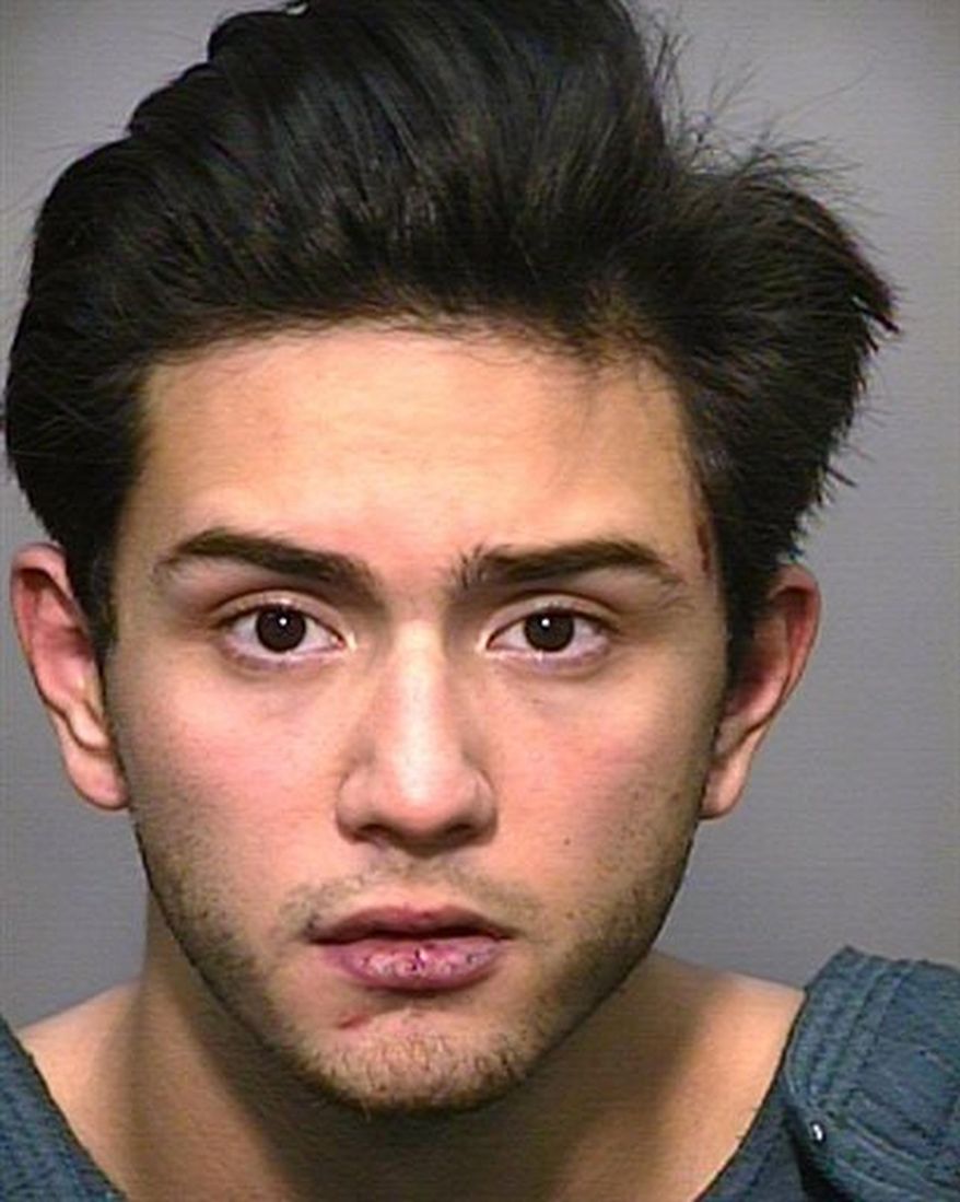 FILE - This undated file photo provided by Northern Arizona University Police Department shows a police mug shot of Steven Jones, who was arrested in a shooting on campus in Flagstaff, Ariz. A prosecutor portrayed the former Northern Arizona University student as a killer who carried out "his own deranged sense of justice" when he opened fire on a group of people during a drunken fight near the campus. Closing arguments began Tuesday, April 25, 2017, in the murder trial against Jones, who killed one student and wounded three others in what he said was self-defense after being punched in the face just a few weeks into his freshman year in October 2015. (Northern Arizona University Police Department via AP, File)