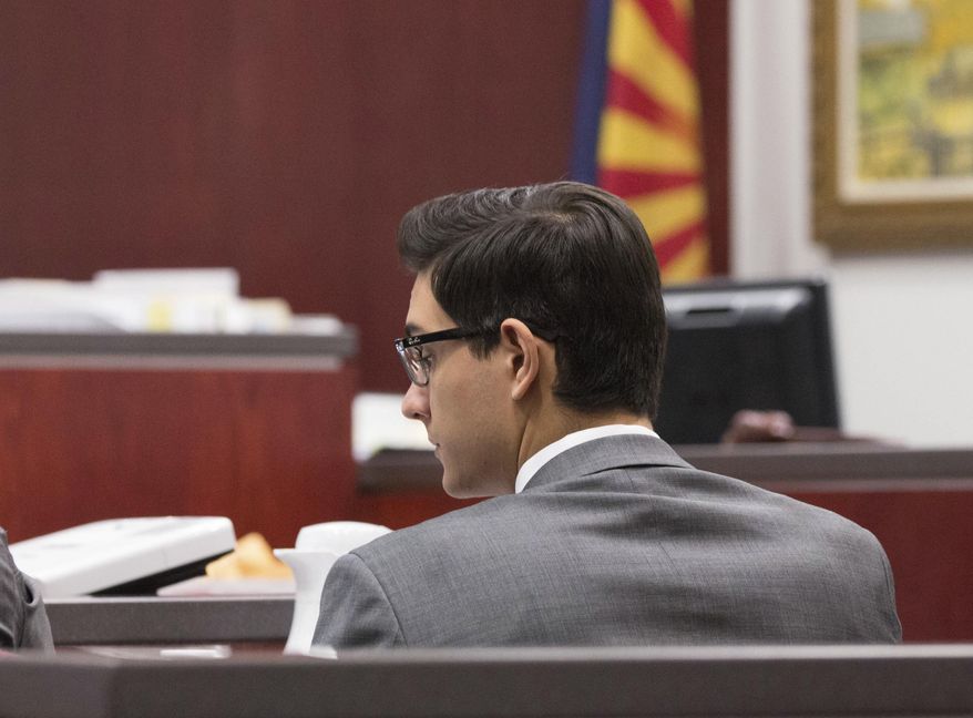 In this photo provided by Halie Chavez, Steven Jones listens to closing statements on Tuesday, April 25, 2017, in Flagstaff, Ariz. Closing arguments began Tuesday, April 25, in Jones' murder trial, who killed one student and wounded three others in what he said was self-defense after being punched in the face just a few weeks into his freshman year in October 2015. (Halie Chavez/The Lumberjack via AP)