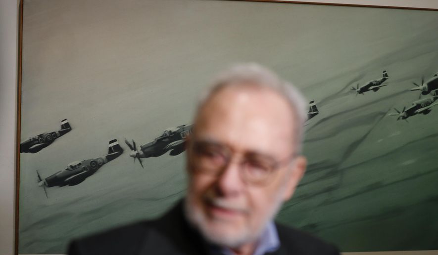 German painter Gerhard Richter stands in front of his work during a press preview for his exhibition downtown Prague, Czech Republic, Tuesday, April 25, 2017. The exhibition starts on April 26, 2017 and last until Sept. 3, 2017. (AP Photo/Petr David Josek)