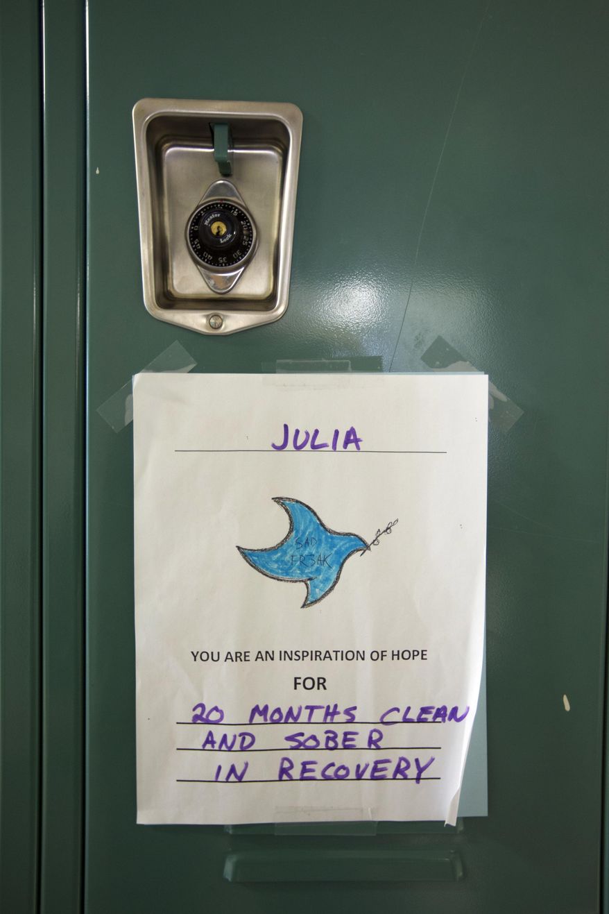 In this Monday, March 13, 2017 photo, an inspirational message is posted on a student's locker at Hope Academy in Indianapolis. For teenagers in treatment for addiction, returning to school means resisting offers to get high with old friends. Researchers said these kids do better at special “recovery schools” that use peer pressure in a different way, to support sobriety. (AP Photo/Michael Conroy)