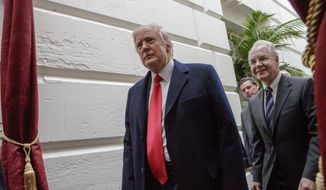 In this March 21, 2017, file photo, President Donald Trump, followed by Health and Human Services Secretary Tom Price, leaves Capitol Hill Washington after rallying support for the Republican health care overhaul with GOP lawmakers. (AP Photo/J. Scott Applewhite, File)