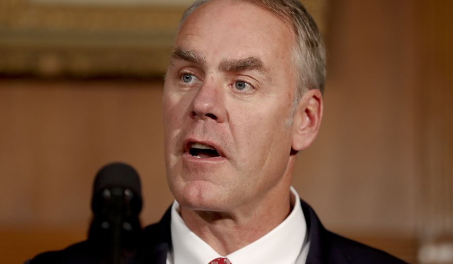 Interior Secretary Ryan Zinke speaks at the Interior Department in Washington, Wednesday, April 26, 2017, before President Donald Trump signed an Antiquities Executive Order. (AP Photo/Carolyn Kaster)