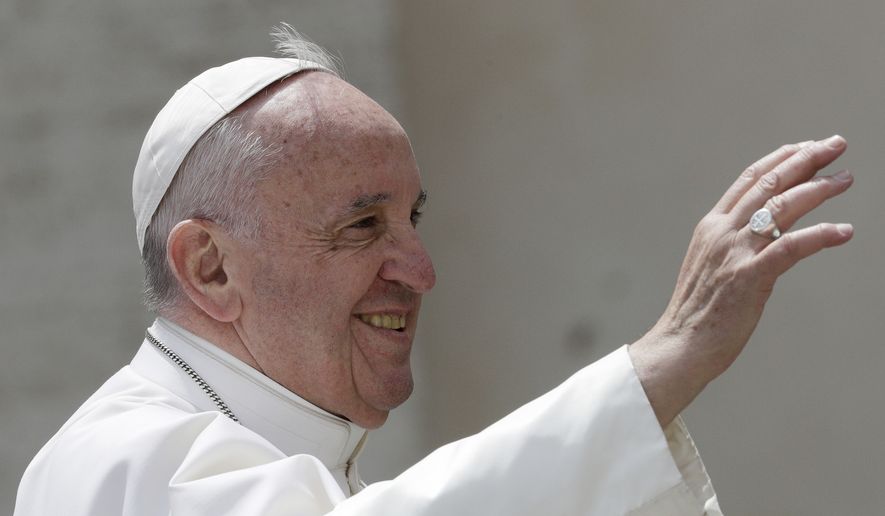 Pope Francis salutes at the end of his weekly general audience in St. Peter&#39;s square at the Vatican, Wednesday, April 26, 2017. (AP Photo/Andrew Medichini)