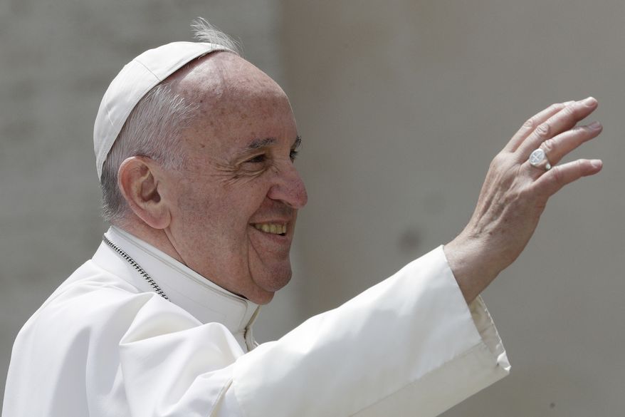 Pope Francis salutes at the end of his weekly general audience in St. Peter's square at the Vatican, Wednesday, April 26, 2017. (AP Photo/Andrew Medichini)