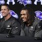 FILE - In this March 20, 2017, file photo, newly signed Baltimore Ravens cornerback Brandon Carr, right, speaks alongside coach John Harbaugh during an introductory news conference at the NFL football team&#x27;s practice facility in Owings Mills, Md. Ravens moved quickly in free agency to enhance a defense that faltered in the latter stage of a disappointing 8-8 season.General manager Ozzie Newsome fortified the backfield by signing Carr and safety Tony Jefferson. He also retained free agent nose tackle Brandon Williams with a $54 million, five-year deal. “We came out of the gates quick, we were aggressive, really turning over every stone,” Harbaugh said. (AP Photo/Patrick Semansky, File)
