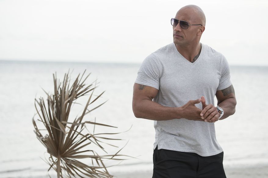This image released by HBO shows Dwayne Johnson from the HBO series, "Ballers." Johnson is an entertainment machine. The 44-year-old former pro-wrestler turned global superstar had a 12 month shooting schedule last year, and is on track for another in 2017. It’s no wonder he topped Forbes’ highest paid actors list in 2016 with an estimated $64.5 million payday. (HBO via AP)