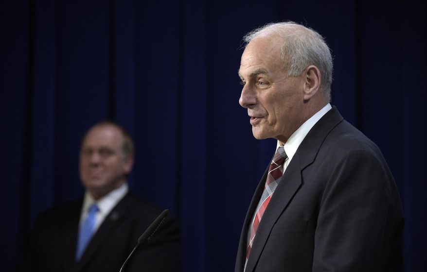 Homeland Security Secretary John Kelly, right, accompanied by acting Immigration and Customs Enforcement (ICE) Director Tom Homan, speaks during a news conference at ICE in Washington, Wednesday, April 26, 2017, to announce the opening of new Victims of Immigration Crime Engagement (VOICE) office. (AP Photo/Susan Walsh)