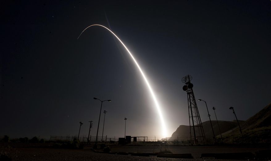In this image taken with a slow shutter speed and provided by the U.S. Air Force, an unarmed Minuteman 3 intercontinental ballistic missile launches during an operational test early Wednesday, April 26, 2017, from Vandenberg Air Force Base, Calif. The target of the test was in the Pacific Ocean. An Air Force statement said the mission was part of a program to test the effectiveness, readiness, and accuracy of the weapon system. (Senior Airman Ian Dudley/U.S. Air Force via AP) ** FILE **
