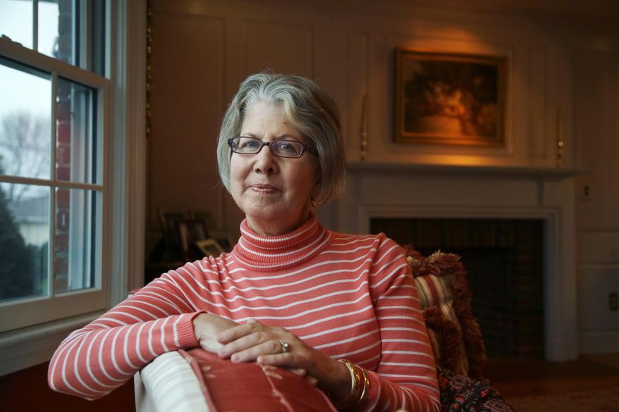 ADVANCE FOR RELEASE AT 12:01 A.M. SUNDAY, MAY 7, 2017 AND THEREAFTER - In this Wednesday, April 19, 2017 photo Lisa Connor sits for a photograph at her home in the Jamaica Plain neighborhood of Boston. Thousands of parents each year clash with their children's school districts over the level of special education services. Connor's daughter has been diagnosed with a complex mix of disabilities that include epilepsy and an autism spectrum diagnosis. (AP Photo/Steven Senne)