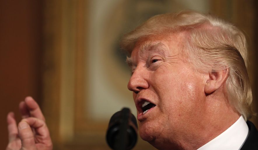 President Donald Trump speaks at the Interior Department in Washington, Wednesday, April 26, 2017, before signing an Antiquities Executive Order. The president is asking for a review of the designation of tens of millions of acres of land as "national monuments." (AP Photo/Carolyn Kaster)