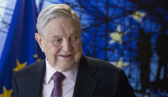 George Soros, founder and chairman of the Open Society Foundation, waits for the start of a meeting at EU headquarters in Brussels on Thursday, April 27, 2017. (Olivier Hoslet, Pool Photo via AP) ** FILE **