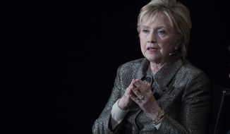 In this photo taken April 6, 2017, former Secretary of State Hillary Clinton speaks in New York. A congressional committee on Thursday, April 27, 2017, asked the Justice Department to consider criminally prosecuting a technology services company that was involved in maintaining a private email server for Hillary Clinton. (AP Photo/Mary Altaffer)