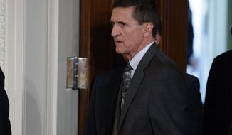 FILE - In this Feb. 13, 2017 file photo, Mike Flynn arrives for a news conference in the East Room of the White House in Washington. Documents released by lawmakers show Flynn, now former national security adviser, was warned when he retired from the military in 2014 not to take foreign money without &amp;quot;advance approval&amp;quot; by Pentagon authorities.  (AP Photo/Evan Vucci, File)