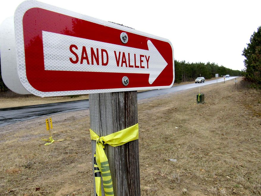 ADVANCE FOR MAY 1 - This April 12, 2017 photo shows signage in the town of Rome, Wis., directing visitors to Sand Valley Golf Resort. The courses cannot be seen from a roadway but are located between Highway 13 and Petenwell Lake. (Barry Adams /Wisconsin State Journal via AP)
