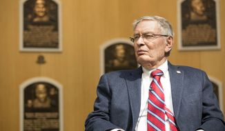 In this photo provided by the National Baseball Hall of Fame and Museum, former Major League Baseball Commissioner Bud Selig listens while touring the Hall of Fame during his orientation visit, Thursday, April 27, 2017, in Cooperstown, N.Y. Selig will be inducted to the Hall of Fame during the summer of 2017. (Milo Stewart Jr./National Baseball Hall of Fame and Museum via AP)
