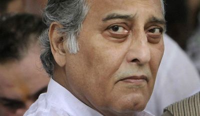 FILE - In this Aug. 15, 2011, file photo, Bollywood actor Vinod Khanna attends the funeral of versatile Indian actor Shammi Kapoor in Mumbai. A hospital official says Vinod Khanna, a dashing Bollywood actor turned politician, has died of cancer in Mumbai. He was 70. (AP Photo/Rajanish Kakade, File)