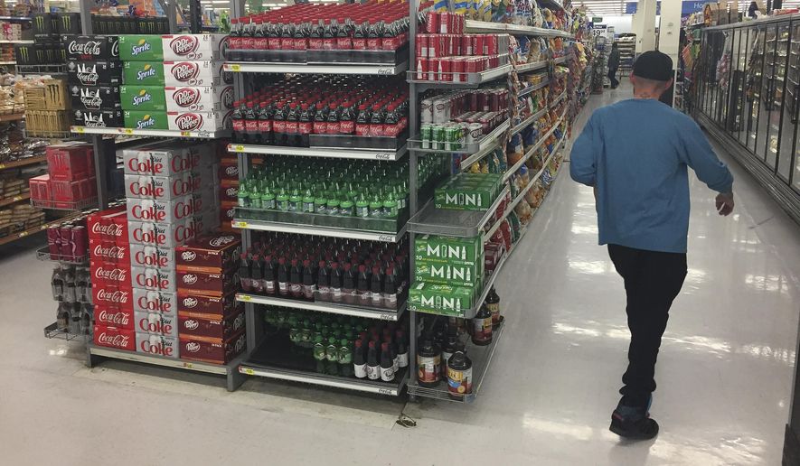 Some federal government policies drive up the costs of basic needs such as food, hitting low-income households disproportionately. (Associated Press/File)