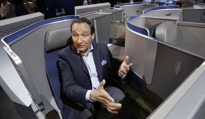 FILE - In this Thursday, June 2, 2016, file photo, United Airlines CEO Oscar Munoz speaks during an interview in New York, while seated in the seating configuration of the carrier&#39;s new Polaris service. United Airlines says it will raise the limit to $10,000 on payments to customers who give up seats on oversold flights and will increase training for employees as it deals with fallout from the video of a passenger being violently dragged from his seat. Munoz said his response, in which he blamed the passenger and supported his employees, was &amp;quot;insensitive beyond belief.&amp;quot; (AP Photo/Richard Drew, File)
